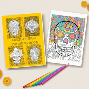 Mexican Skull Malbuch mit einem angemalten Totenkopf, Buntstiften und Studentenblumen